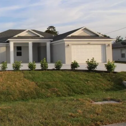 Rent this 4 bed house on 5598 Wesley Road in Port Saint Lucie, FL 34986