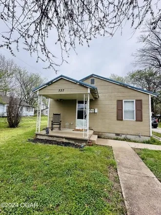 Buy this 2 bed house on 2703 East 8th Street in East Joplin, Joplin