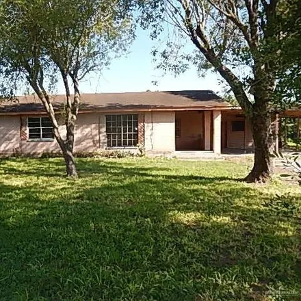 Buy this 4 bed house on 1602 Ramos Drive in Ramosville Colonia, Weslaco