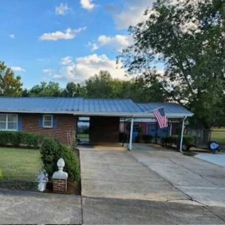 Buy this 4 bed house on Our Lady of Shoals Catholic Church in East 5th Street, Tuscumbia