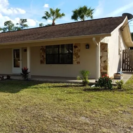 Rent this 4 bed house on 4661 Seville Avenue in Brevard County, FL 32926