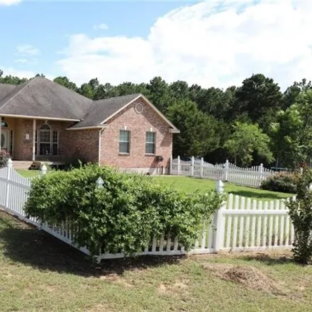 Rent this 3 bed house on 171 Rye Grass Lane in Bastrop County, TX 78602