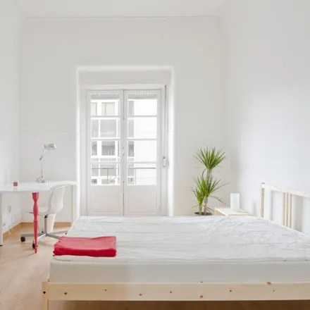 Rent this 8 bed room on Avenida da República 48 in 1050-195 Lisbon, Portugal