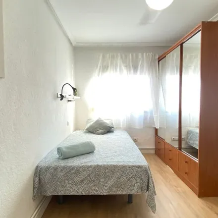 Rent this 4 bed room on Colegio de Educación Infantil y Primaria Carlos Sainz de los Terreros in Calle de Cártama, 1