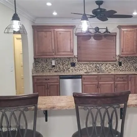 Buy this 2 bed house on 267 Jacaranda Dr Unit 25 in Fort Lauderdale, Florida