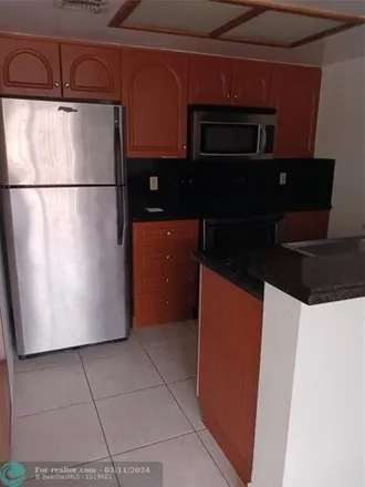 Buy this 2 bed condo on 3201 Coral Lake Drive in Coral Springs, FL 33065