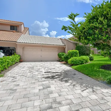 Buy this 4 bed townhouse on 7811 Wind Key Drive in Boca West, Palm Beach County