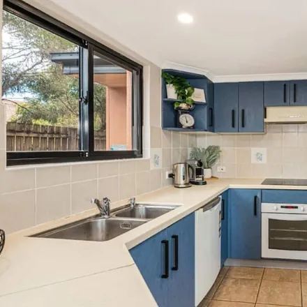 Rent this 3 bed townhouse on Woorim QLD 4507