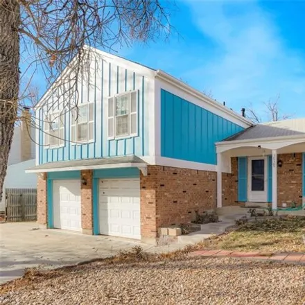 Buy this 4 bed house on 1537 South Vaughn Circle in Aurora, CO 80012