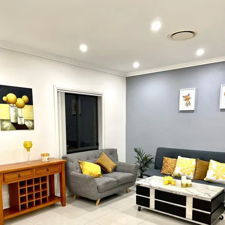 Rent this 6 bed house on Sydney in Revesby, AU