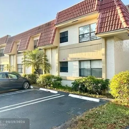 Rent this 2 bed condo on 10996 Royal Palm Boulevard in Coral Springs, FL 33065