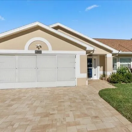 Buy this 3 bed house on 661 Sheridan Woods Drive in West Melbourne, FL 32904