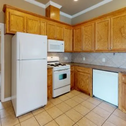 Rent this 4 bed apartment on 908 Crystal Dove Avenue in Dove Crossing, College Station