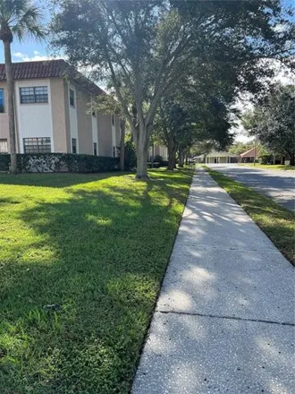 Rent this 1 bed apartment on 1778 Belleair Forest Drive in Belleair, Pinellas County