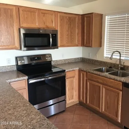 Rent this 3 bed house on 2918 West Chanute Pass in Phoenix, AZ 85041