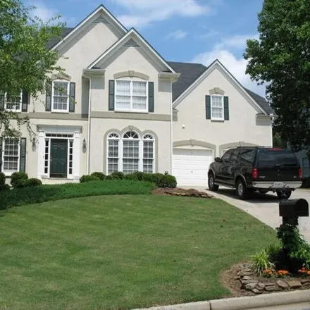 Rent this 4 bed house on 235 Ashebourne Trail in Johns Creek, GA 30005