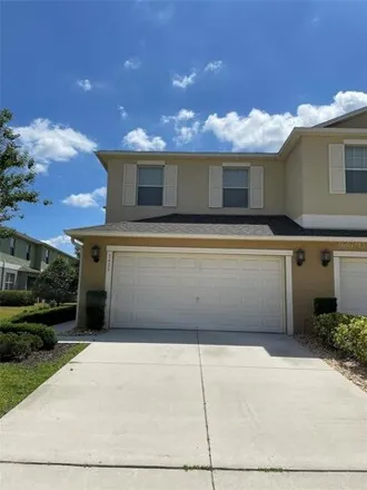 Rent this 3 bed townhouse on 3431 Rodrick Circle in Meadow Woods, Orange County
