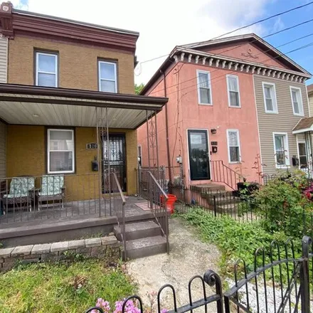 Rent this 2 bed townhouse on 120 Elm St in Camden, New Jersey