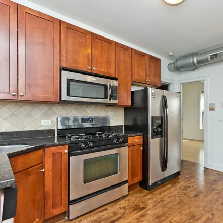 Rent this 2 bed condo on 1014 West Roscoe Street