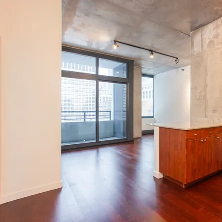 Rent this 2 bed condo on 235 W Van Buren St