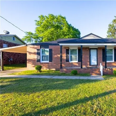 Buy this 4 bed house on 1605 7th St S in Phenix City, Alabama