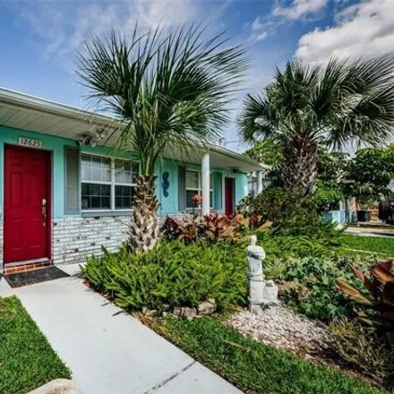 Buy this 4 bed house on 12656 1st Isle in Hudson, FL 34667