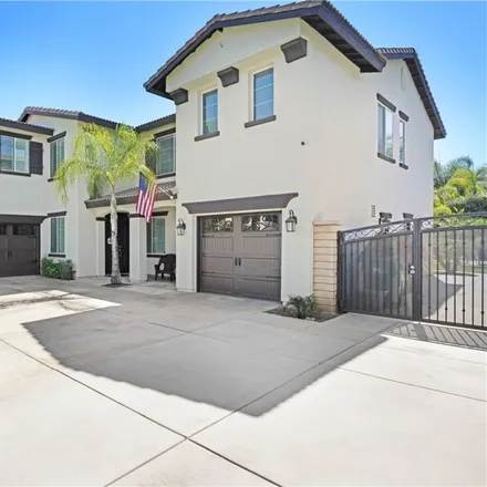 Buy this 6 bed house on 1702 Via Valmonte Circle in Corona, CA 92881