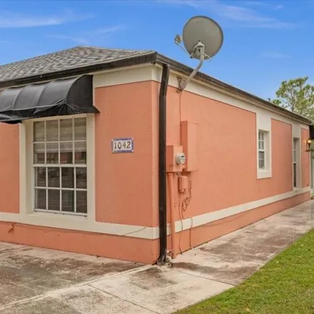 Buy this 3 bed house on 1044 Universal Resorts Place in Osceola County, FL 34744