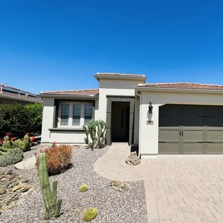Rent this 2 bed house on 1674 East Azafran Trail in San Tan Valley, AZ 85140