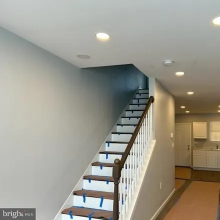 Rent this 2 bed townhouse on 215 South Monroe Street in Baltimore, MD 21223