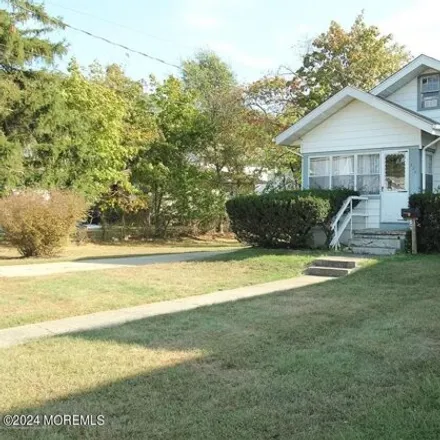 Rent this 3 bed house on 324 Roosevelt Avenue in Oakhurst Manor, Ocean Township