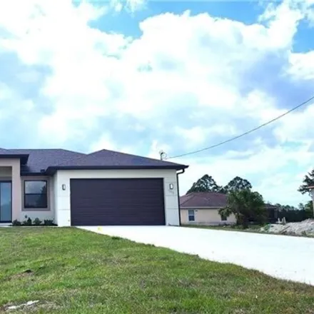Buy this 3 bed house on 1050 Eisenhower Blvd in Lehigh Acres, Florida
