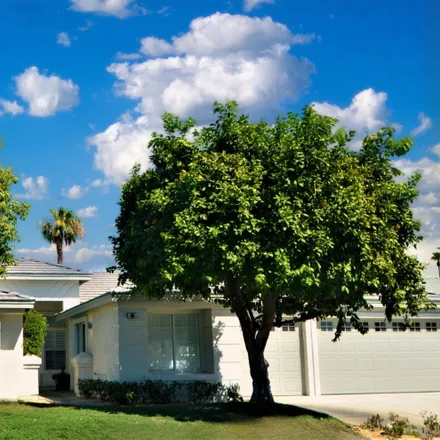 Rent this 4 bed house on 66 Sutton Place East in Palm Desert, CA 92211