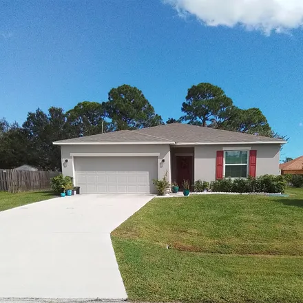 Rent this 3 bed house on 1925 Southwest Cycle Street in Port Saint Lucie, FL 34953