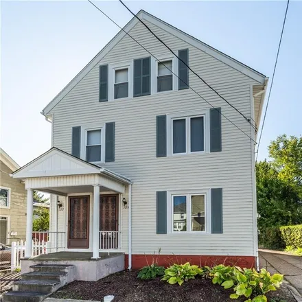 Buy this 5 bed townhouse on 105 Johnson Street in Pawtucket, RI 02860
