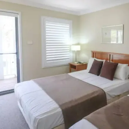 Rent this 2 bed townhouse on Cams Wharf NSW 2281