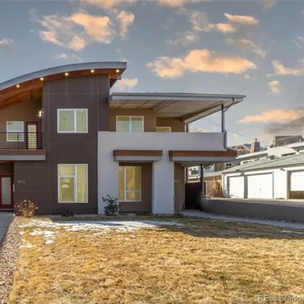 Buy this 4 bed house on 1832 West 34th Avenue in Denver, CO 80211