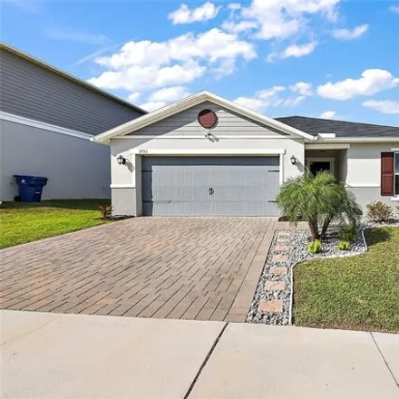 Buy this 4 bed house on 1751 Wilson Prairie Circle in Groveland, FL 34715