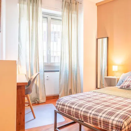 Rent this 4 bed room on Via Santa Rita da Cascia 35 in 20143 Milan MI, Italy