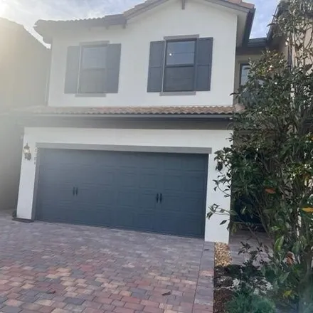 Rent this 3 bed house on Tailshot Court in Florida Gardens, Palm Beach County