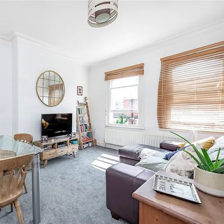 Rent this 2 bed townhouse on Tregothnan Road in Stockwell Park, London