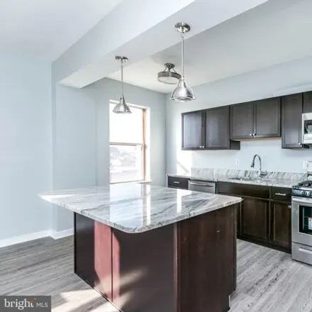 Rent this 1 bed apartment on 1001 Liquors in East Eager Street, Baltimore
