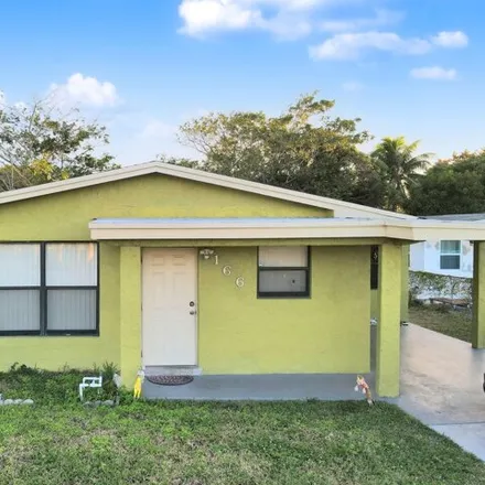 Buy this 3 bed house on 148 Southwest 5th Street in Carver Heights, Deerfield Beach
