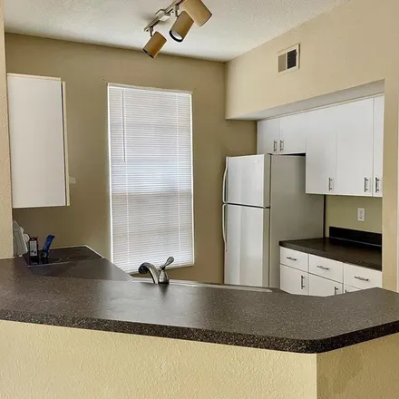 Rent this 1 bed apartment on Raleigh Street in MetroWest, Orlando