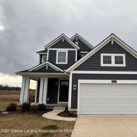 Buy this 4 bed house on 11703 Hickory Drive in Delta Charter Township, MI 48837