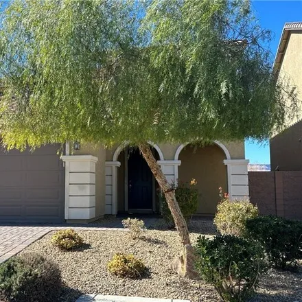Rent this 4 bed house on 6441 Pochman Mesa Street in Spring Valley, NV 89113