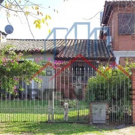 Buy this 3 bed house on Fray J. N. González in Partido de La Matanza, B1778 FQA Ciudad Evita