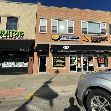 Rent this 2 bed house on Roy's Hair Salon in 113 Broadway Avenue, Melrose Park