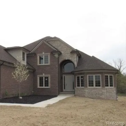 Buy this 4 bed house on 6615 Pond Drive in Washington Charter Township, MI 48094