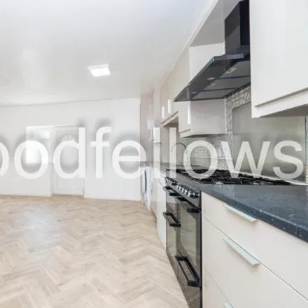 Rent this 4 bed townhouse on Manor Road in London, SM2 7AE
